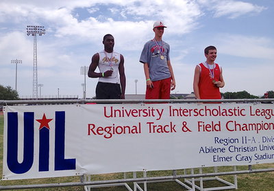 Image: Italy Gladiator senior TaMarcus Sheppard achieving (Left) is presented his silver medal at the champions’ podium after achieving a personal best in the high jump of 6’,3" during the UIL Regional Track And Field Championship in Abilene at the Abilene Christian University campus.