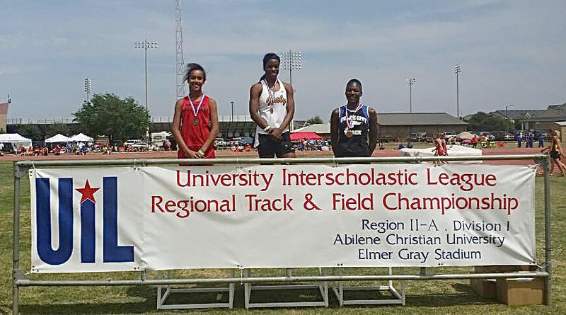 Image: Italy Lady Gladiator junior, Kortnei Johnson (center) is presented a gold medal at the champions’ podium for her 100m dash time of 11.3. Johnson also earned a gold medal in the 200m dash with a time of 23.6 during the UIL Regional Track And Field Championship in Abilene at the Abilene Christian University campus. Johnson is state bound in three events, including the sprint relay.