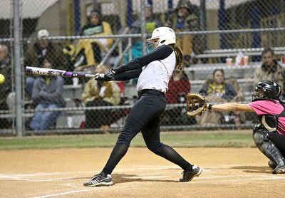 Image: Italy’s Lillie Perry tries to finish off South Grand Prairie with a mighty swing of the bat.