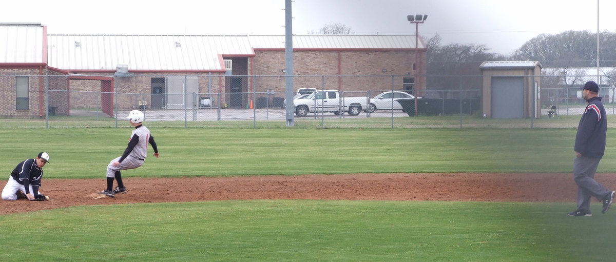 Image: Longhorn makes it  — The Axtell Longhorns waited until the 4th inning to score.