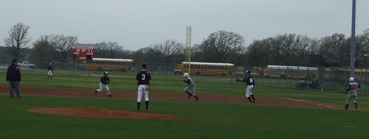 Image: It’s a pickle — Jacinto and Hopkins tracked that Longhorn down and got him out.