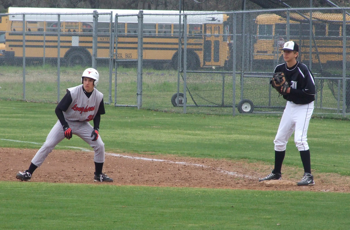 Image: Are you ready? — First baseman, Cole Hopkins, patiently waits to get this Longhorn out.