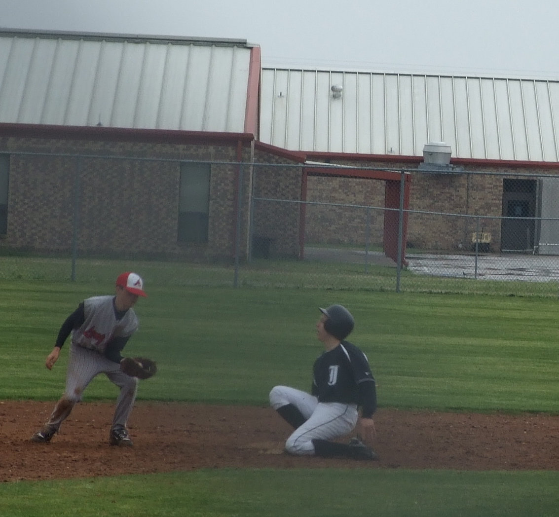 Image: Oh, he’s safe — Jackson makes it to second.