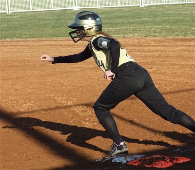 Image: Morgan’s on the move — Morgan Cockerham takes off from 1st base against Cleburne.