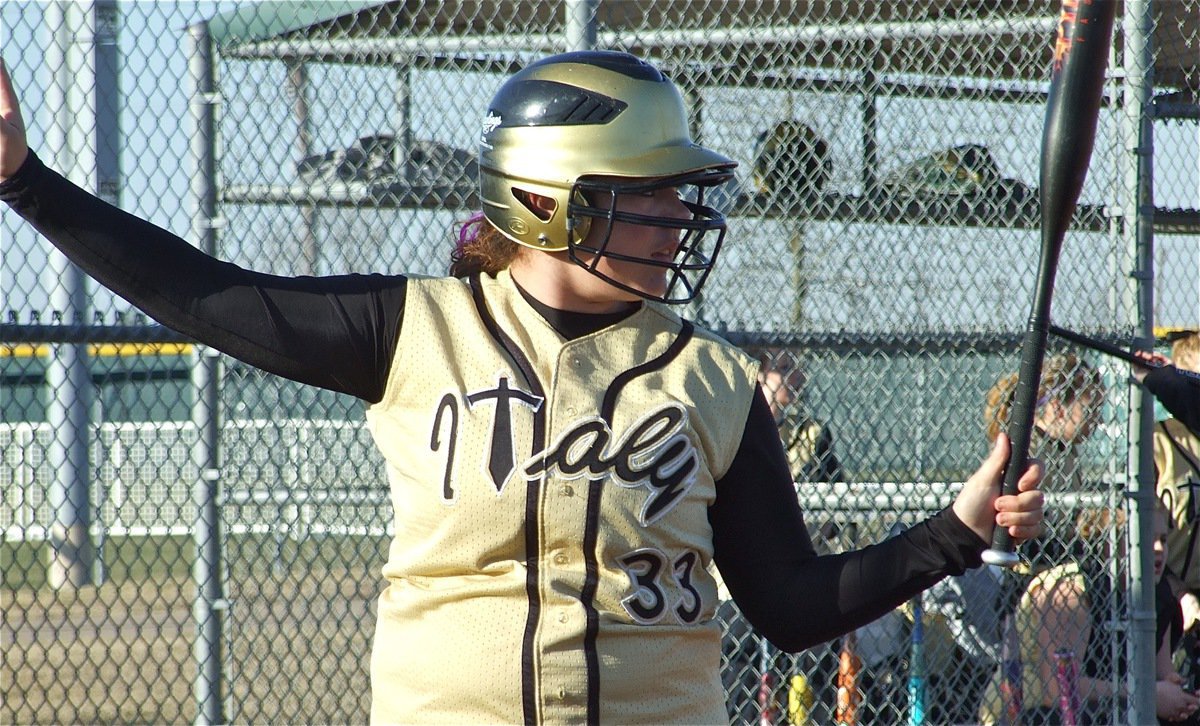 Image: Digging in her cleats — Nikki Brashear(33) get set to unleash the power against the Jackets.