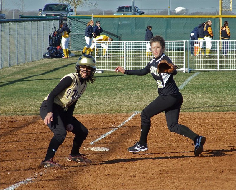 Image: Anna’s a threat — Lady Gladiator Anna Viers(43) tries to force Cleburne into a mistake on 3rd base.