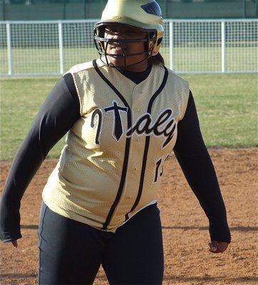 Image: Power stance — Lady Gladiator Sa’Kendra Norwood(15) knows no fear before crossing home plate against Arlington Lamar.