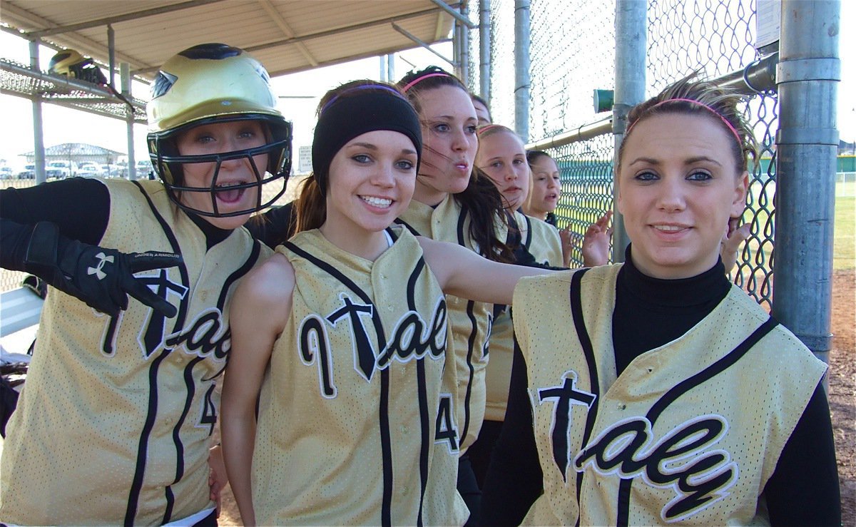 Image: Into the game — Bailey Bumpus, Drew Windham, Breyanna Beets, Drenda Burk, Paola Mata and Mary Tate stay fired-up in the dugout.