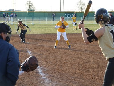 Image: Game on the line — Courtney Westbrook tries to hit in Abby Griffith from 3rd base.
