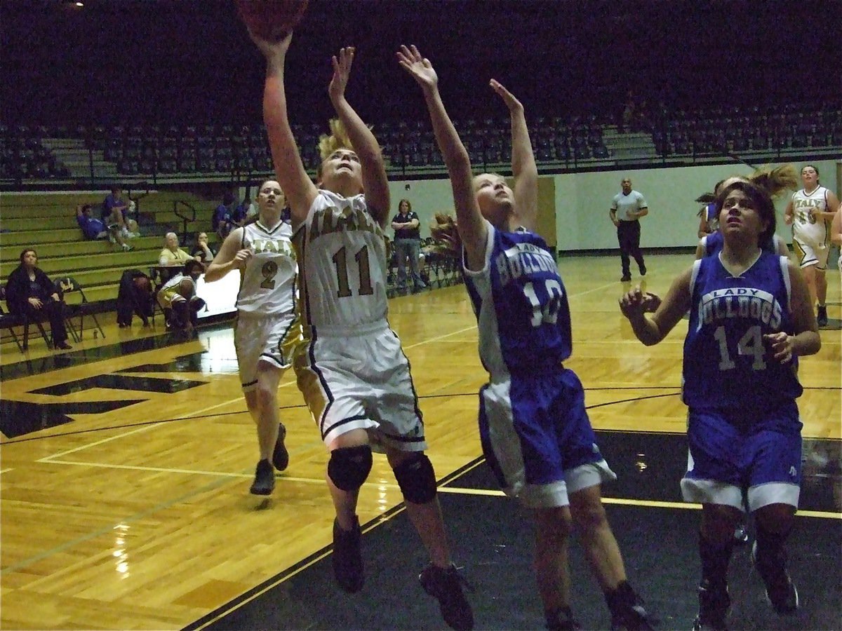 Image: Mary Tate and her JV Lady Gladiators teammates get the win — The Italy JV Lady Gladiators get their first win of the season by flying past the Rice Bulldogs.