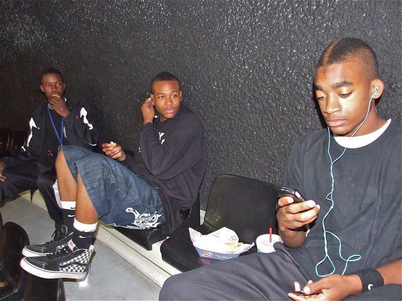 Image: Listen to this — Aaron Thomas, De’Andre Sephus and Heath Clemons relax before their game against the Rice Bulldogs in the upper-deck of the Italy Coliseum.