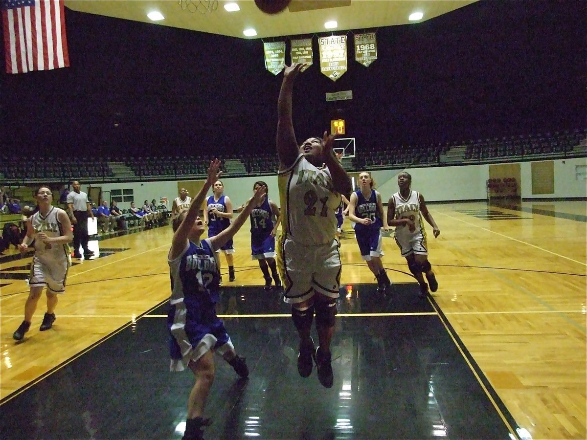 Image: Kadijah Davis scores — Kadijah Davis(21) finishes strong on the fast break scoring 2-points against Rice.