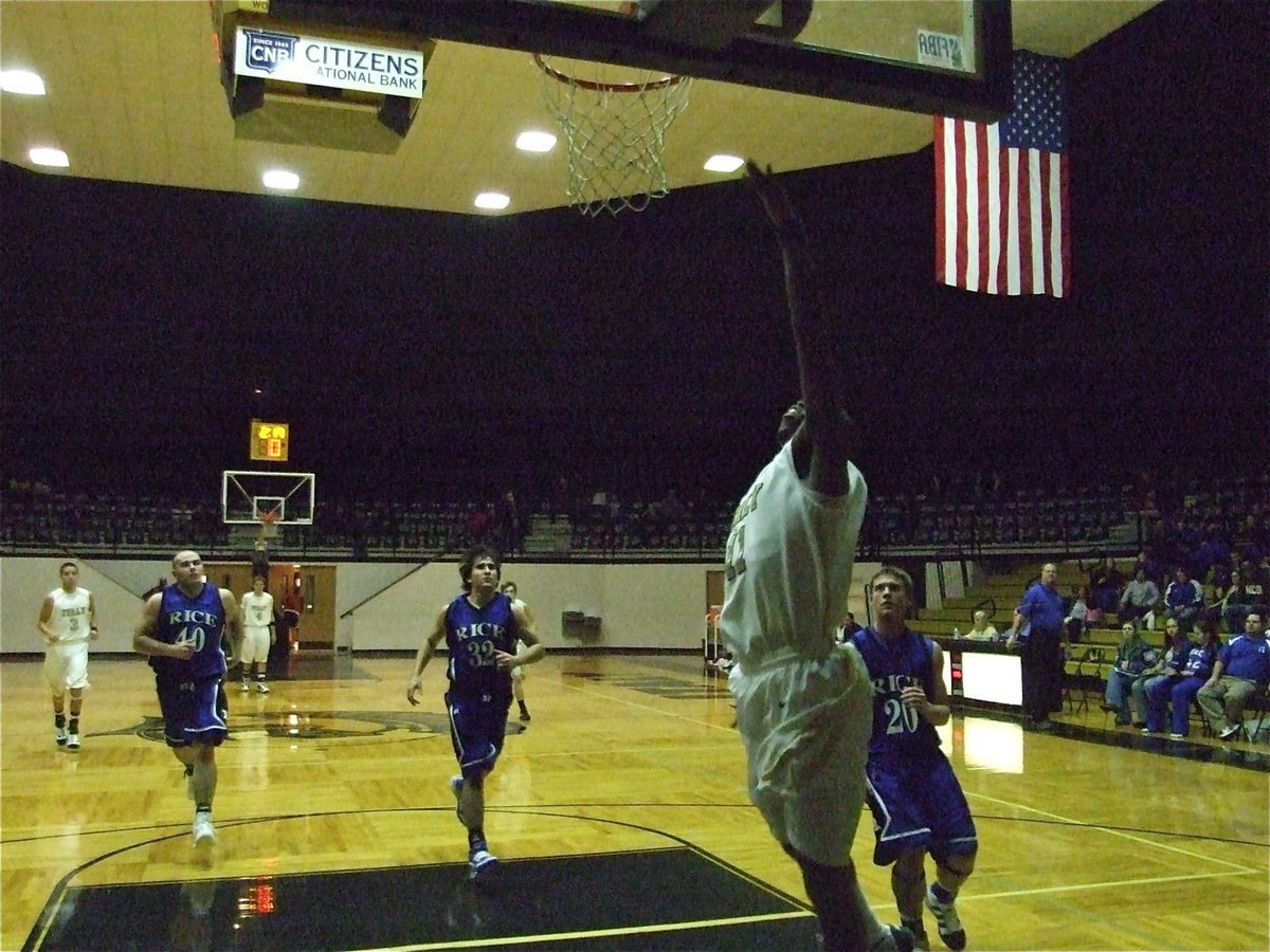 Image: Anderson scores — Jasenio Anderson(11) finishes the fast break for 2-points.