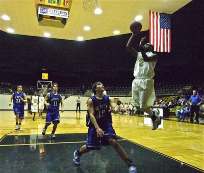 Image: Snoop hoops — Heath Clemons(2) floats in for 2-points.