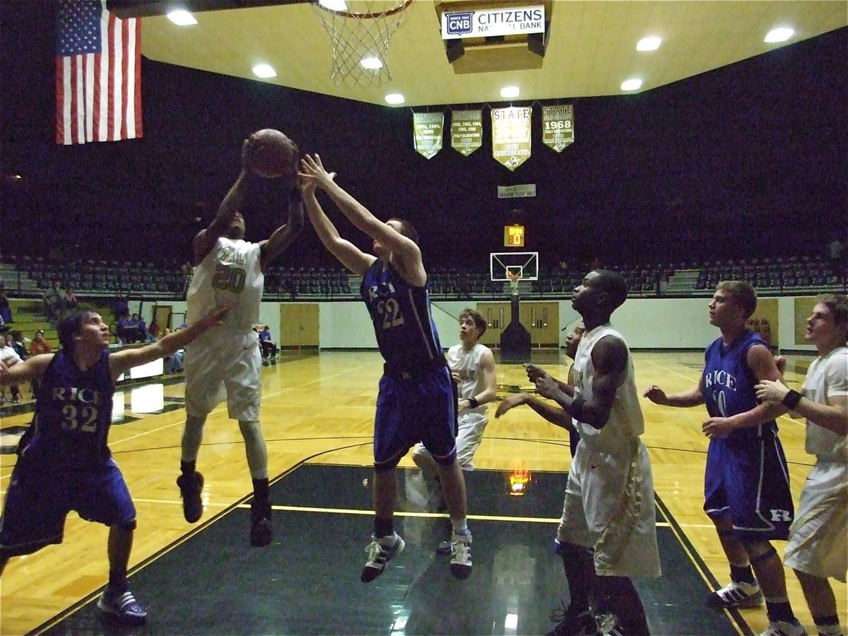 Image: Frazer boards — Corrin Frazer(20) rebounds while Dan Crownover, Aaron Thomas and Ryan Ashcraft move in.