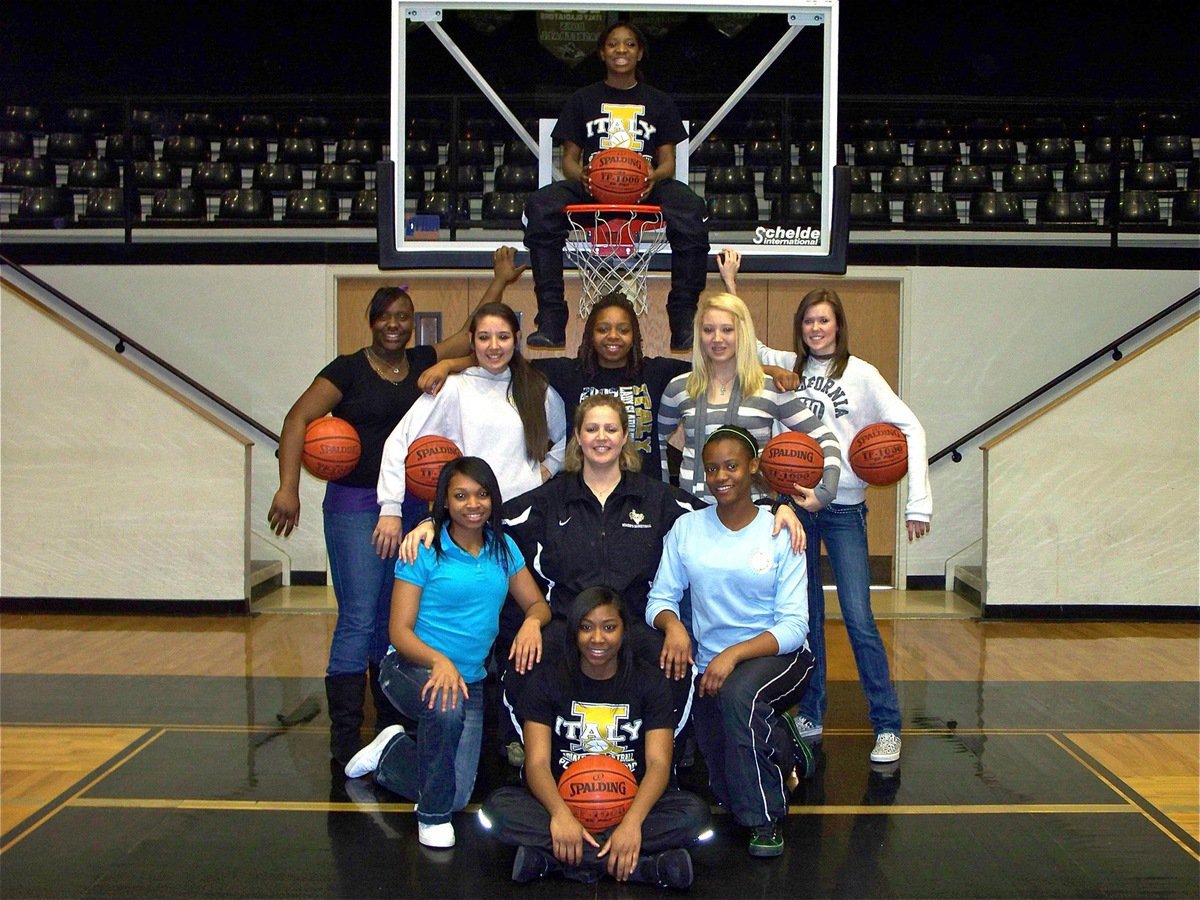 Image: All-District Team — Above the rim: Jameka Copeland Back row: Jimesha Reed, Alyssa Richards, Jaleecia Fleming, Megan Richards and Kaitlyn Rossa Middle row Kyonne Birdsong, Head Coach Stacy McDonald and Brianna Burkhalter Front row: Chante Birdsong