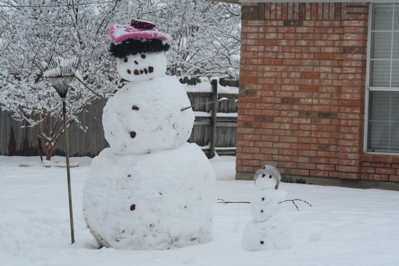 Image: Babysitting Snowman — “I can’t believe I have to babysit you again and rake the snow!”