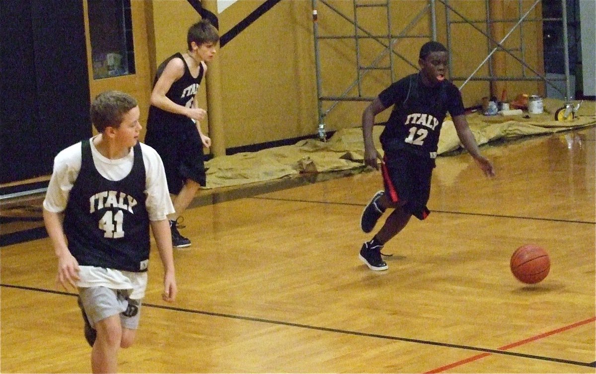 Image: It’s our turn — Bailey Walton(41), Justin Wood and [Name Withheld](12) inbound the ball after a Lady Gladiator score.