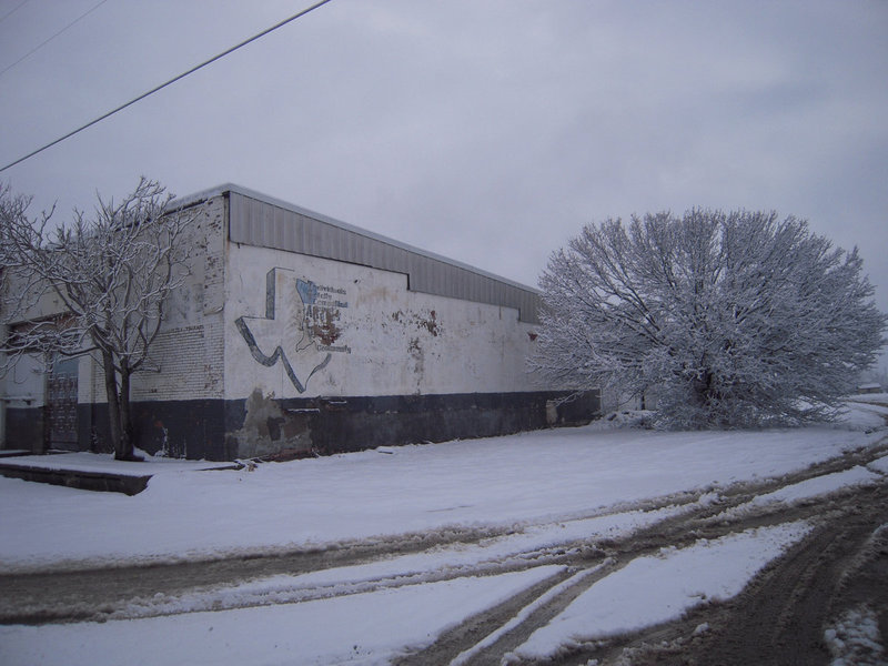 Image: Driving into town — Take a look at this building.  It has changed overnight.