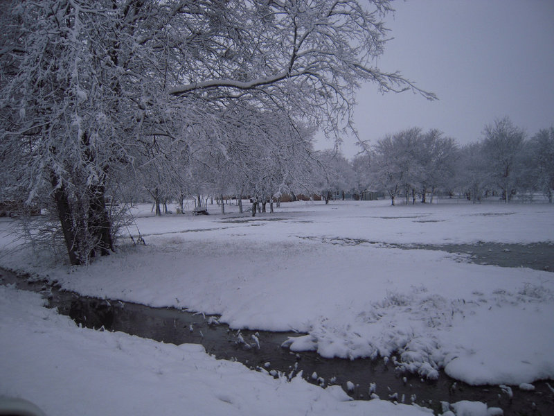 Image: A creek is running — The snow begins to melt on Friday and begins a stream of water.