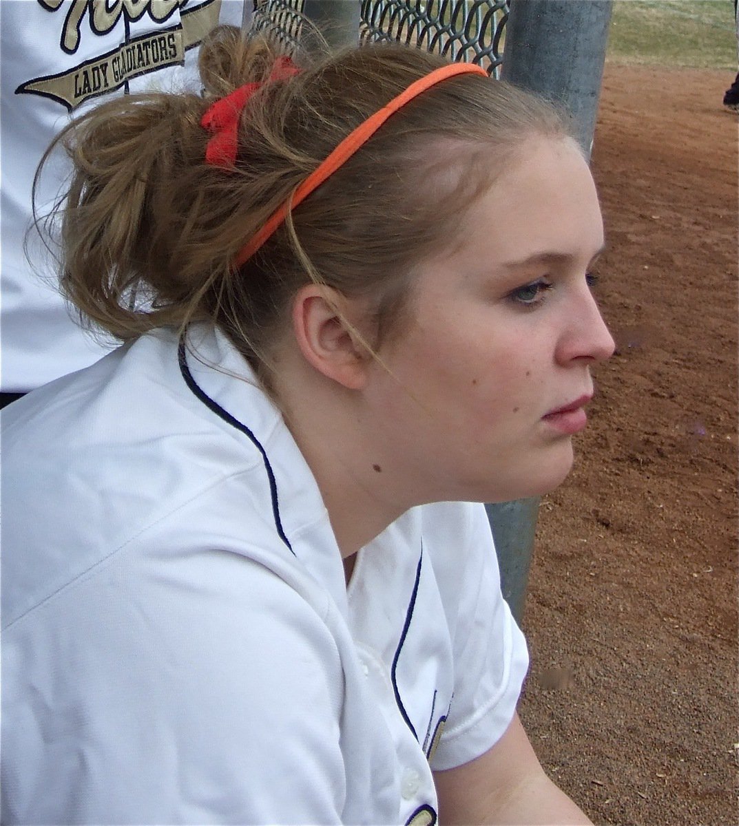 Image: Julia scans field — Julia McDaniel watches as Italy’s hitters spark a 7th inning comeback.