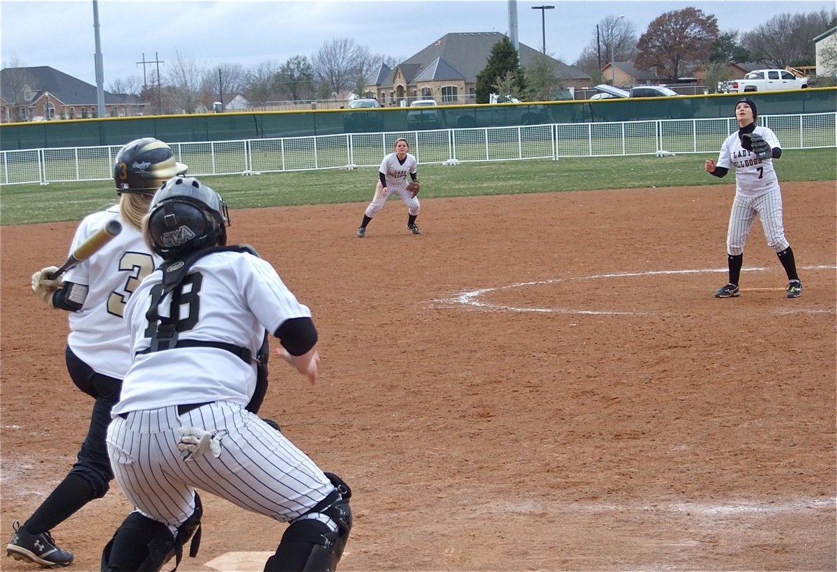 Image: Abby hits it up — Italy’s Abby Griffith(3) gets a piece of the ball but Palmer’s pitcher catches the whole thing for an out.