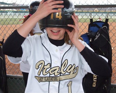 Image: I can’t see! — Rookie Morgan Cockerham puts her rally cap on in an effort to rally the team after being down to Palmer 5-3.