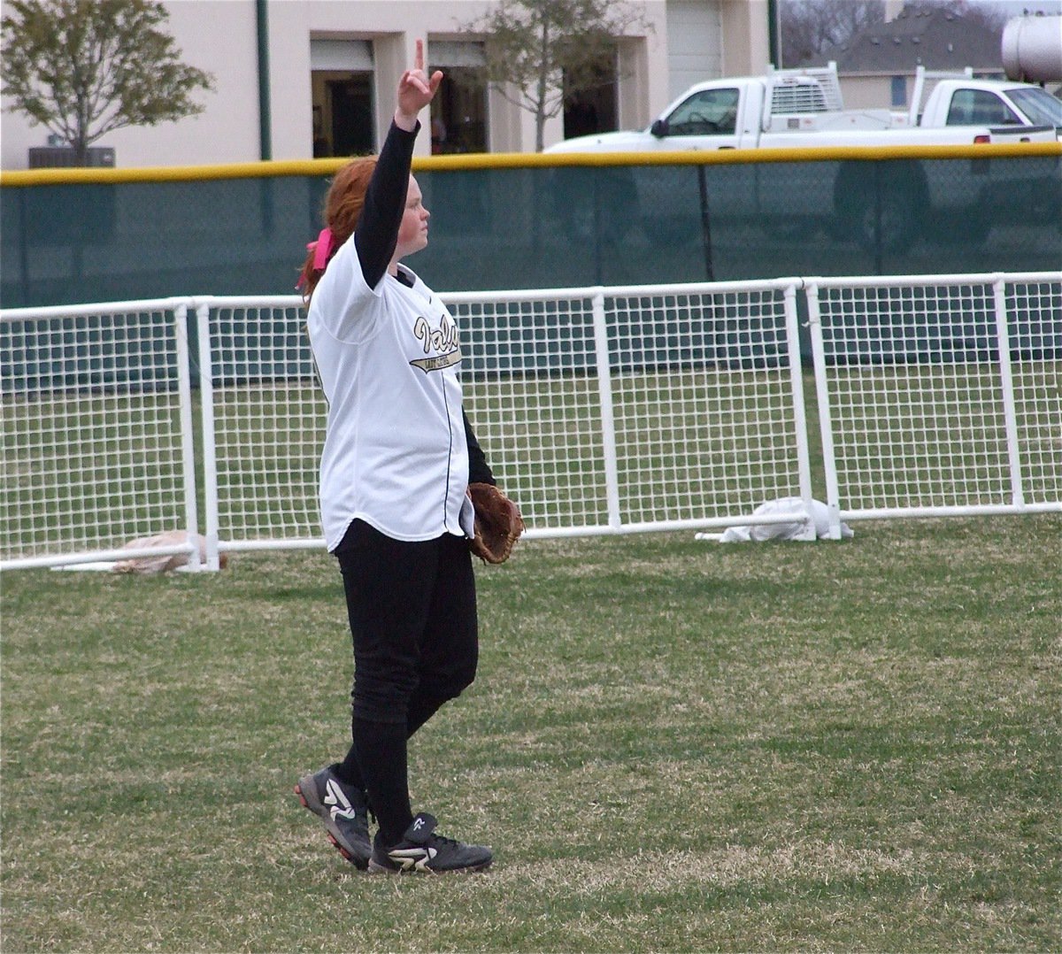 Image: We got one out! — Katie Byers reminds the Italy outfielders that they need 2 more outs while letting Palmer know who’s #1.