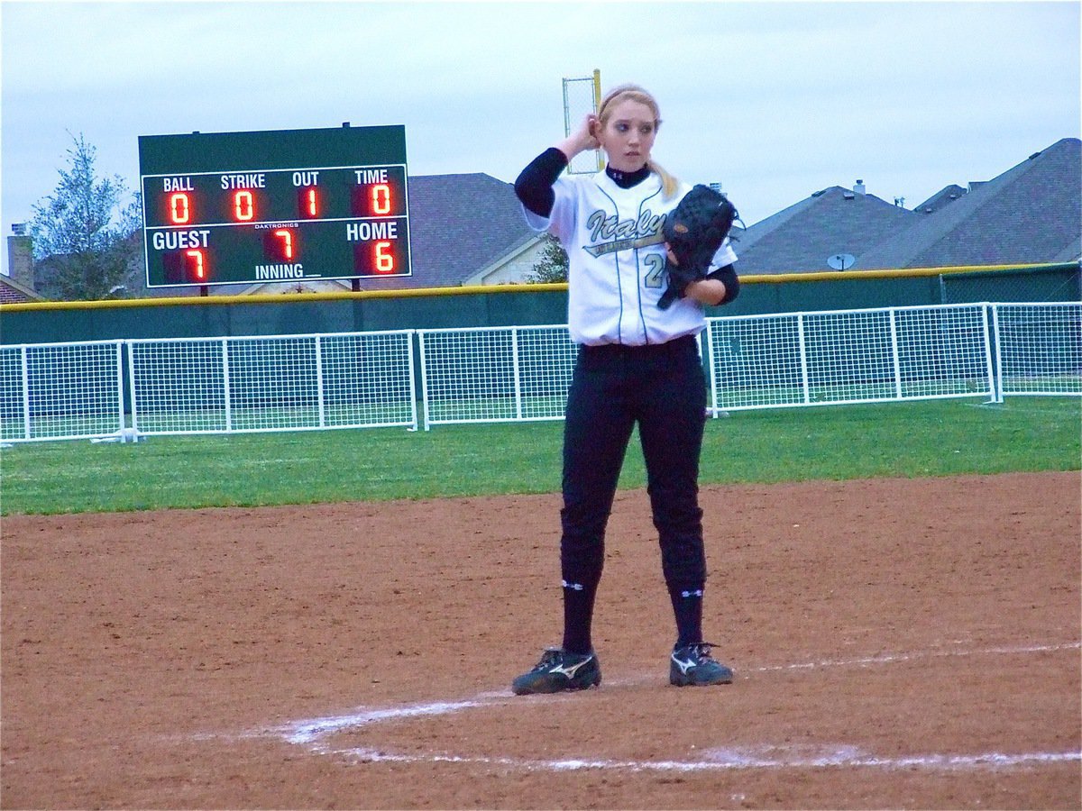 Image: Crunch time… — With Italy clinging to a 1 run lead, 7-6 with 2 outs to go in the bottom of the 7th inning, Megan Richards adjusts her ponytail and digs in.