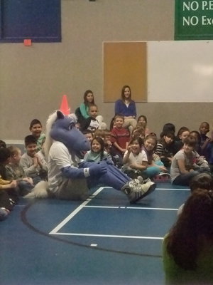 Image: Champ Joined the Team — Champ is delighting the children by joining them on the floor.