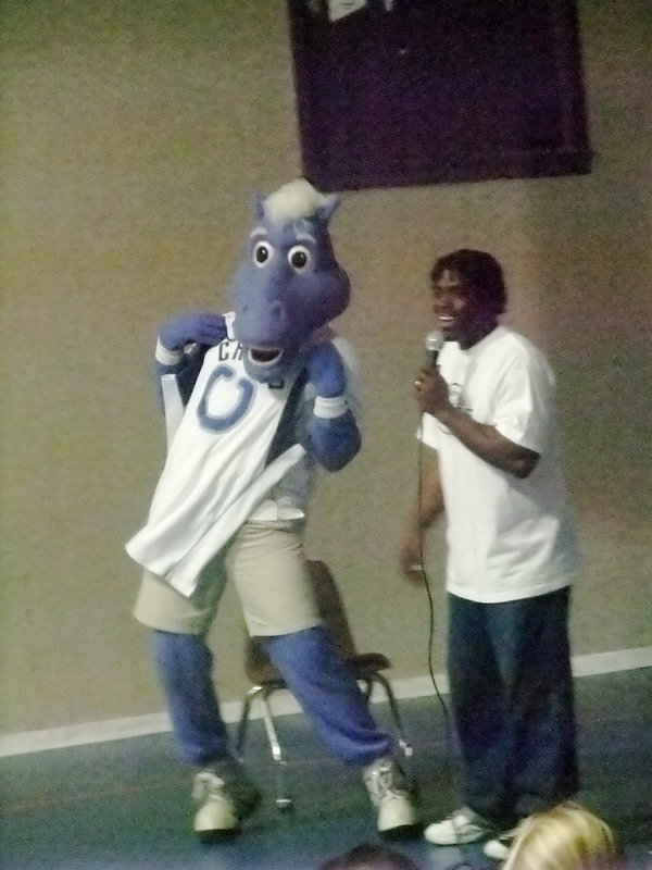 Image: I Love My Jersey — Champ passed his test and was presented with a Mavericks jersey. Byron is proud of the good work he did on his test.