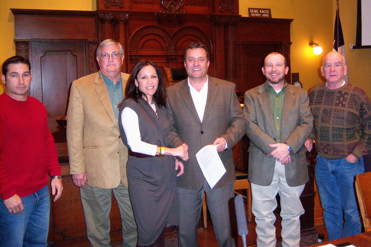 Image: Justice of the Peace Jackie Miller, Jr. receives proclamation from County Judge Carol Bush and precinct 1 Commissioner Dennis Robinson, precinct 2 Commissioner Bill Dodson, precinct 3 Commissioner Heath Sims and Precinct 4 Commissioner Ron Brown.