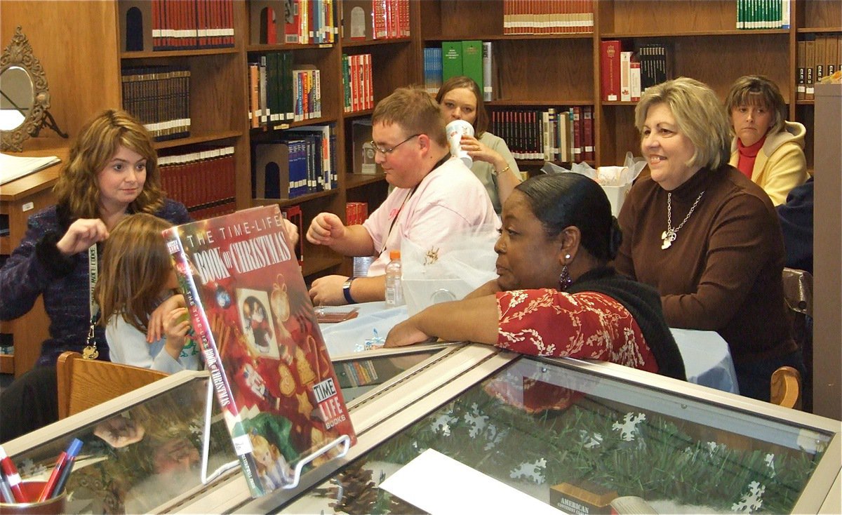 Image: Faculty in attendance — The Italy High School Faculty supports the Bales family with a baby shower held inside the Italy High School Library.