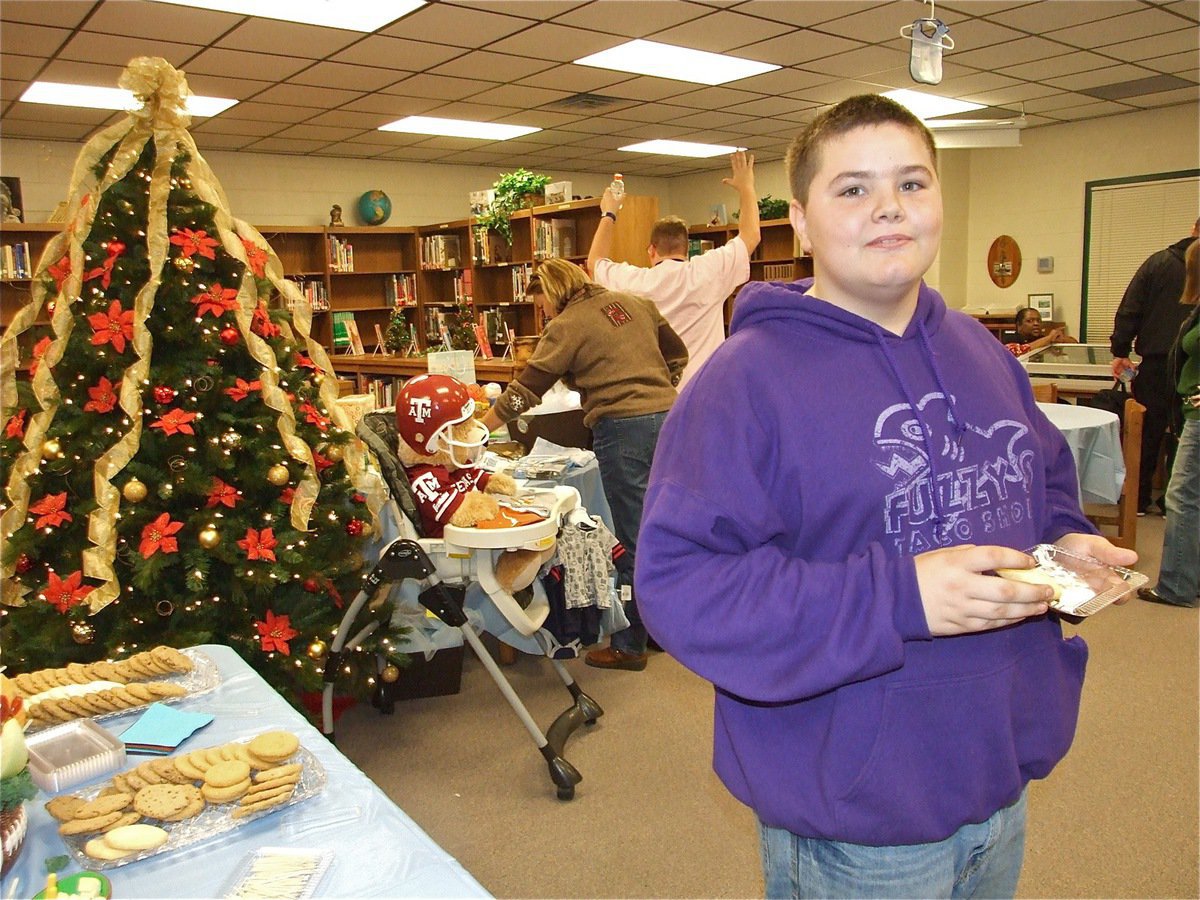 Image: Kelton stocks up — Big Brother, Kelton Bales, stocks up on food items before Kix arrives.