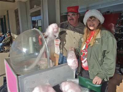 Image: Bobby and Lavonne — Bobby and Lavonne Brock decided to churn out some Cotton Candy for the Italy Chistmas Festival. Yum!