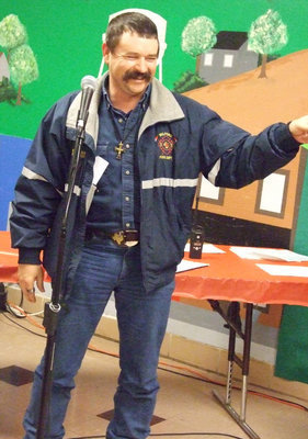 Image: Mark cracks a smile — Mark Jackson, Fire Chief in Milford, made Salutatorian in the Italy Fire Academy.  He thanks his family for all of their support during the long hours of schooling. “This is not just a job, it’s a calling,” Jackson explained to the class.