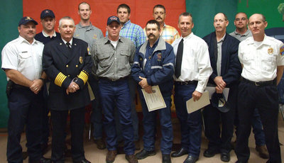 Image: Instructors and their students — Jackie Cate, Brad Chambers and Randy Boyd helped Chief Chambers instruct this class of the Italy Fire Academy.