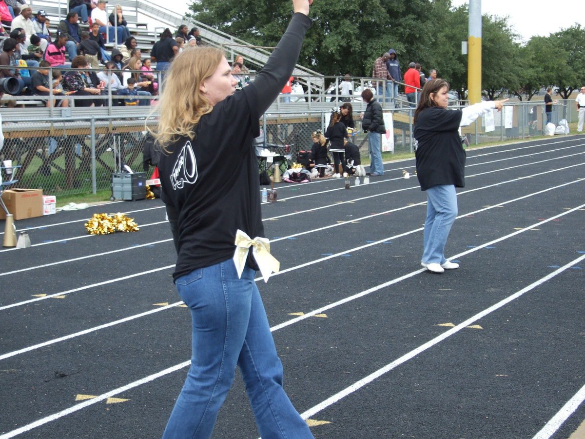 Image: Becky and Robin — IYAA B-Team Cheer Coaches Becky Boyd and Robin Wafer dance along with the cheerleaders during their Superbowl halftime routine The Cha Cha Slide.