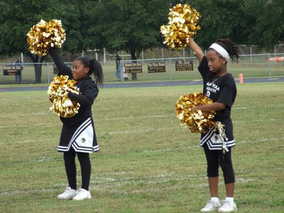 Image: LaJada and Keondra — IYAA B-Team Cheerleaders LaJada Jackson and Keondra Jackson perform during halftime at the NESA Superbowl.
