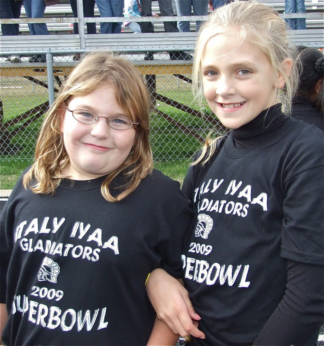 Image: Carlee and Annie — Cheerleaders Carlee Wafer and Annie Perry support the B-Team during the Superbowl.