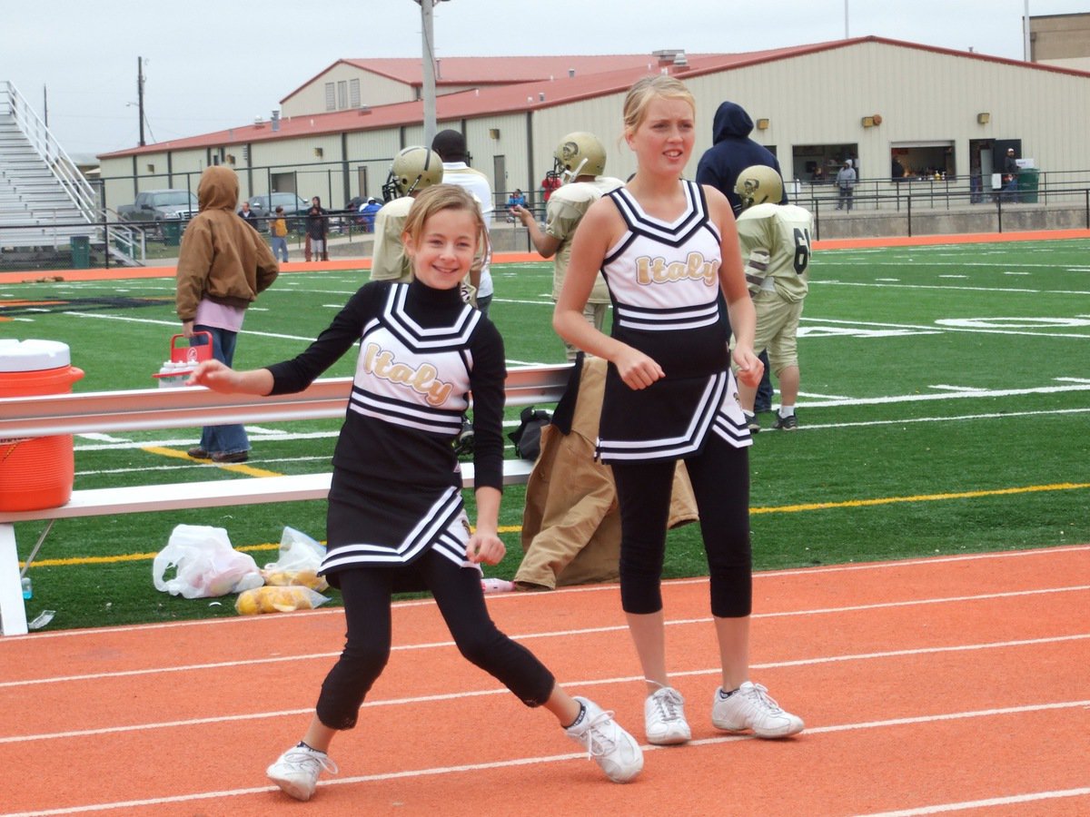 Image: Brittany and Hannah — Brittany Chambers and Hannah Washington clown around during the A-Team’s win over Ferris.