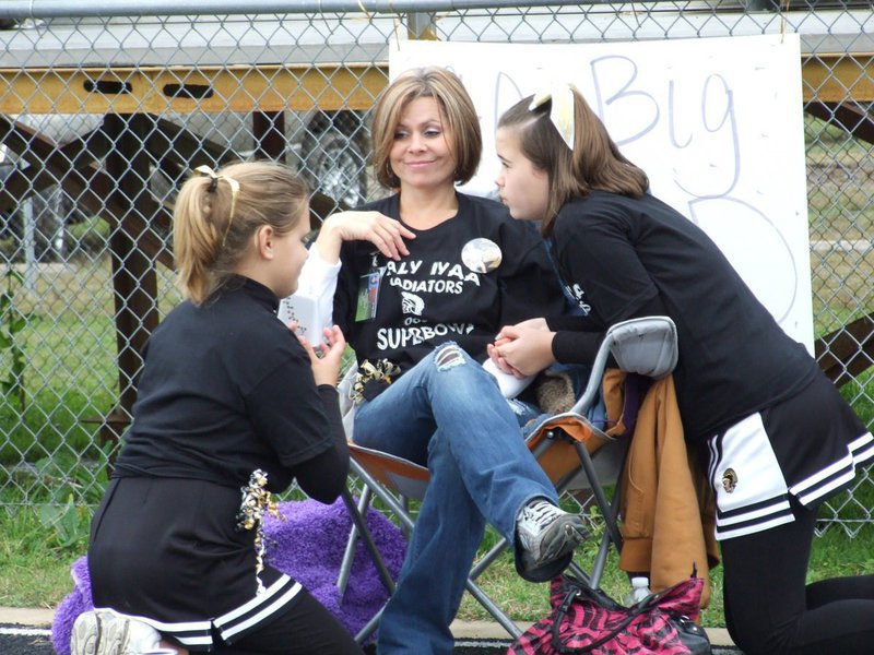 Image: Our big day — Lillie Perry, Cheer Coach Darla Wood and Amber Hooker take a moment at the Superbowl.