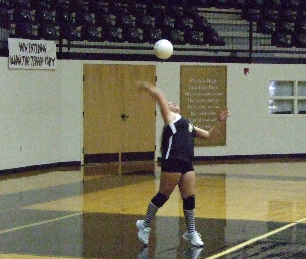 Image: Angelica Garza — Angelica “Jelly” Garza serves the ball.