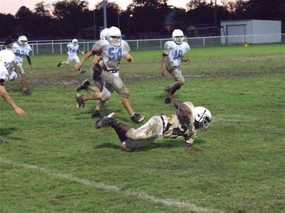 Image: Italy gets tripped up on his way to the endzone.