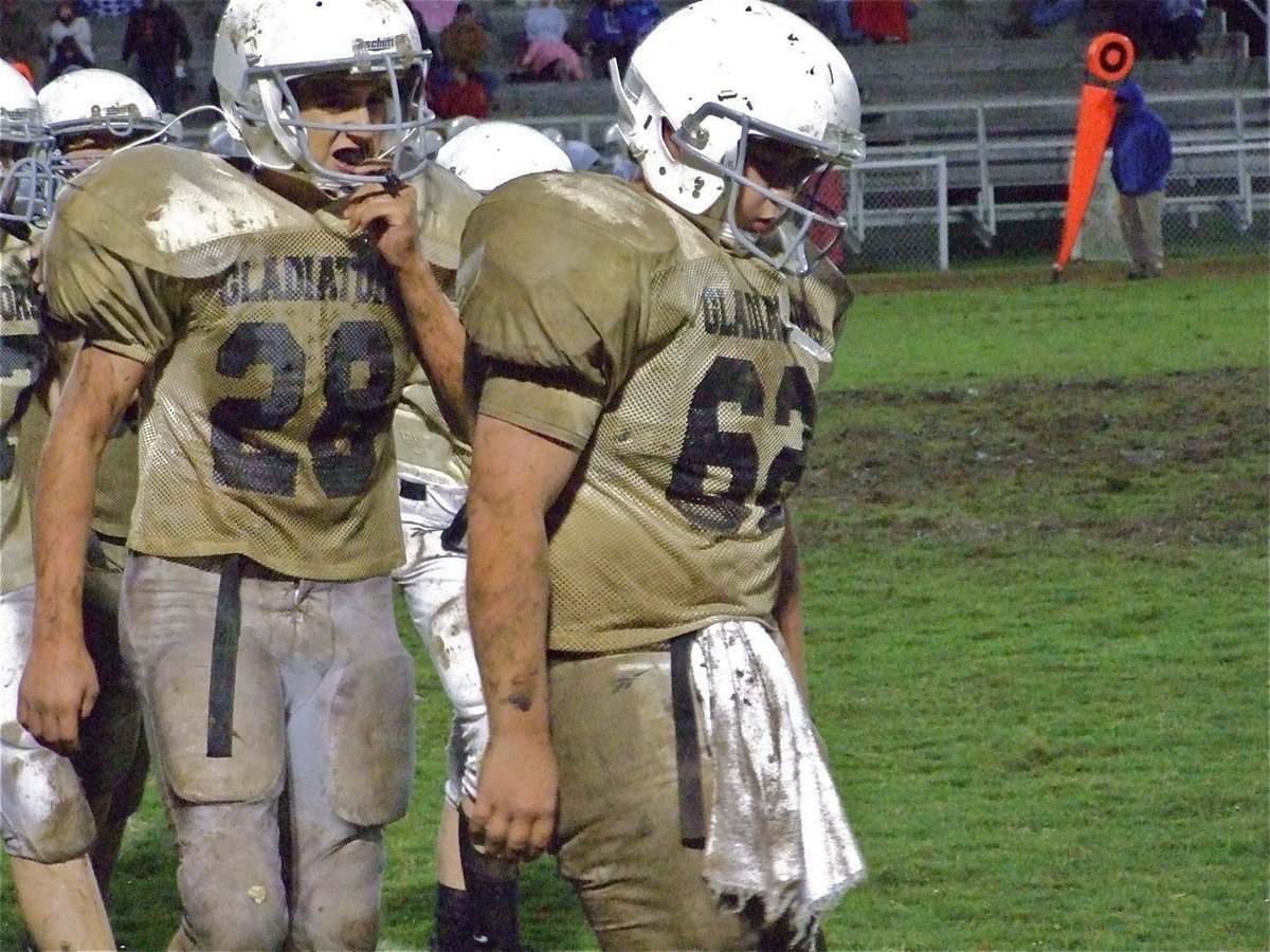 Image: Cody and Kevin — Cody Medrano(28) and Kevin Roldan(62) get in the huddle during an Italy timeout.