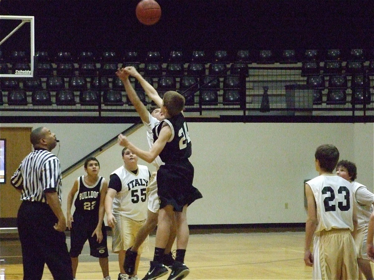 Image: Italy’s 7th grade tips-off one last time — Italy’s 7th grade boys played their final game of the season at Italy Coliseum on Monday, February 8. Above, Chace McGinnis jumps while Kelton Bales(55), Colton Petrey(23) and John Byers get ready to track the ball.