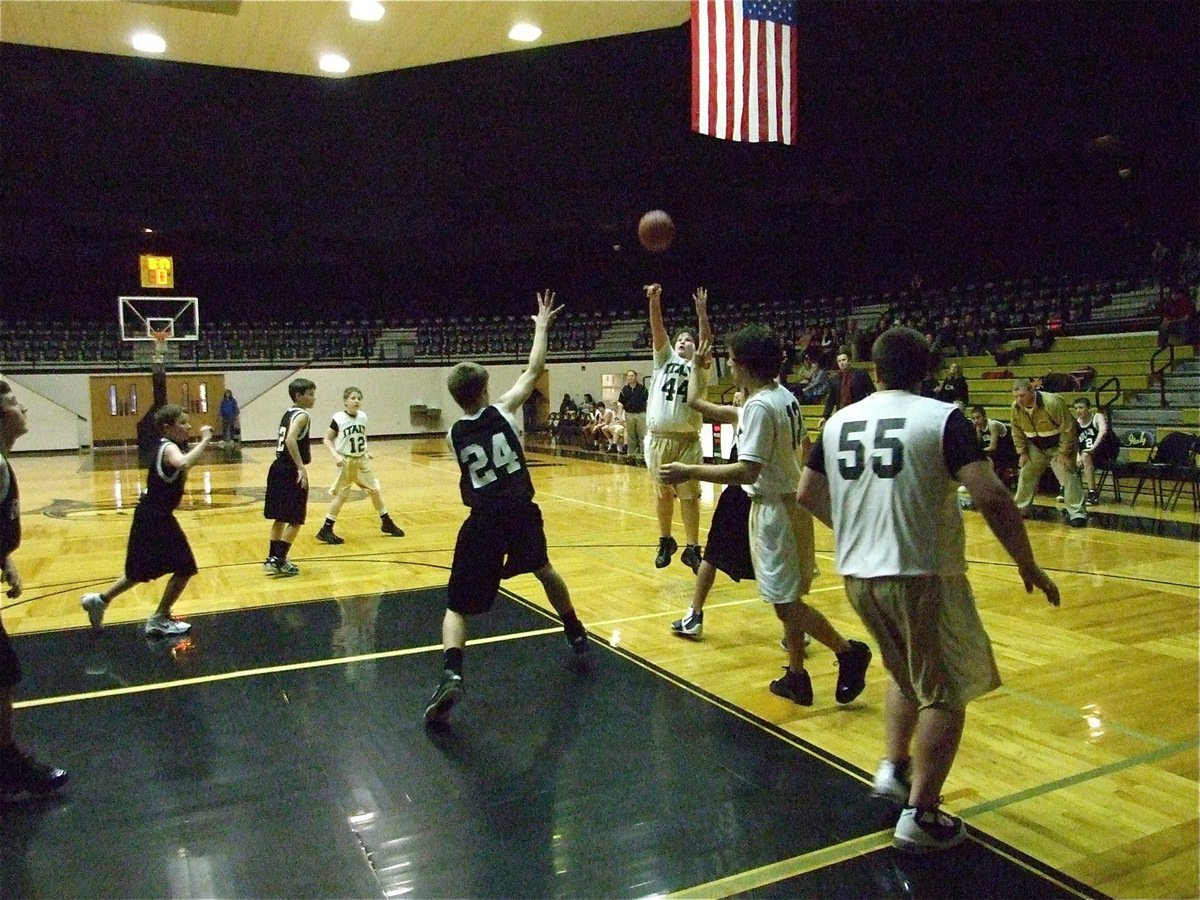 Image: Johnny on the spot — John Byers(44) pulls up for a jump shot against the Palmer Bulldogs.