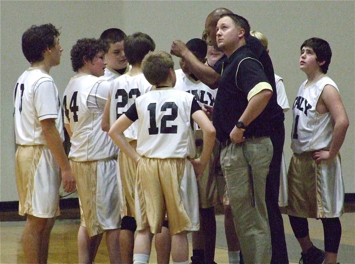 Image: Mayberry and Ward — Coaches Larry Mayberry and Josh Ward try to rally the team.