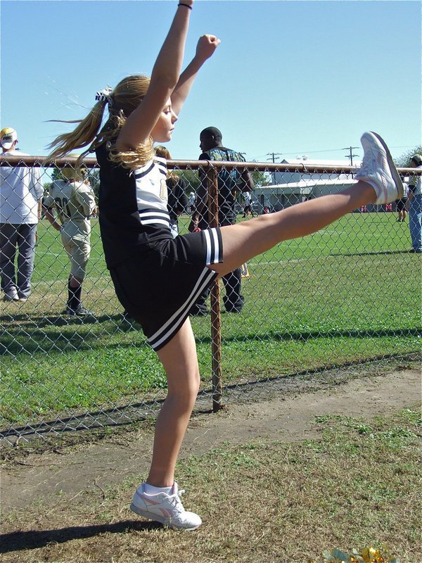 Image: Spirit kick — Brooke DeBorde high kicks during the game.