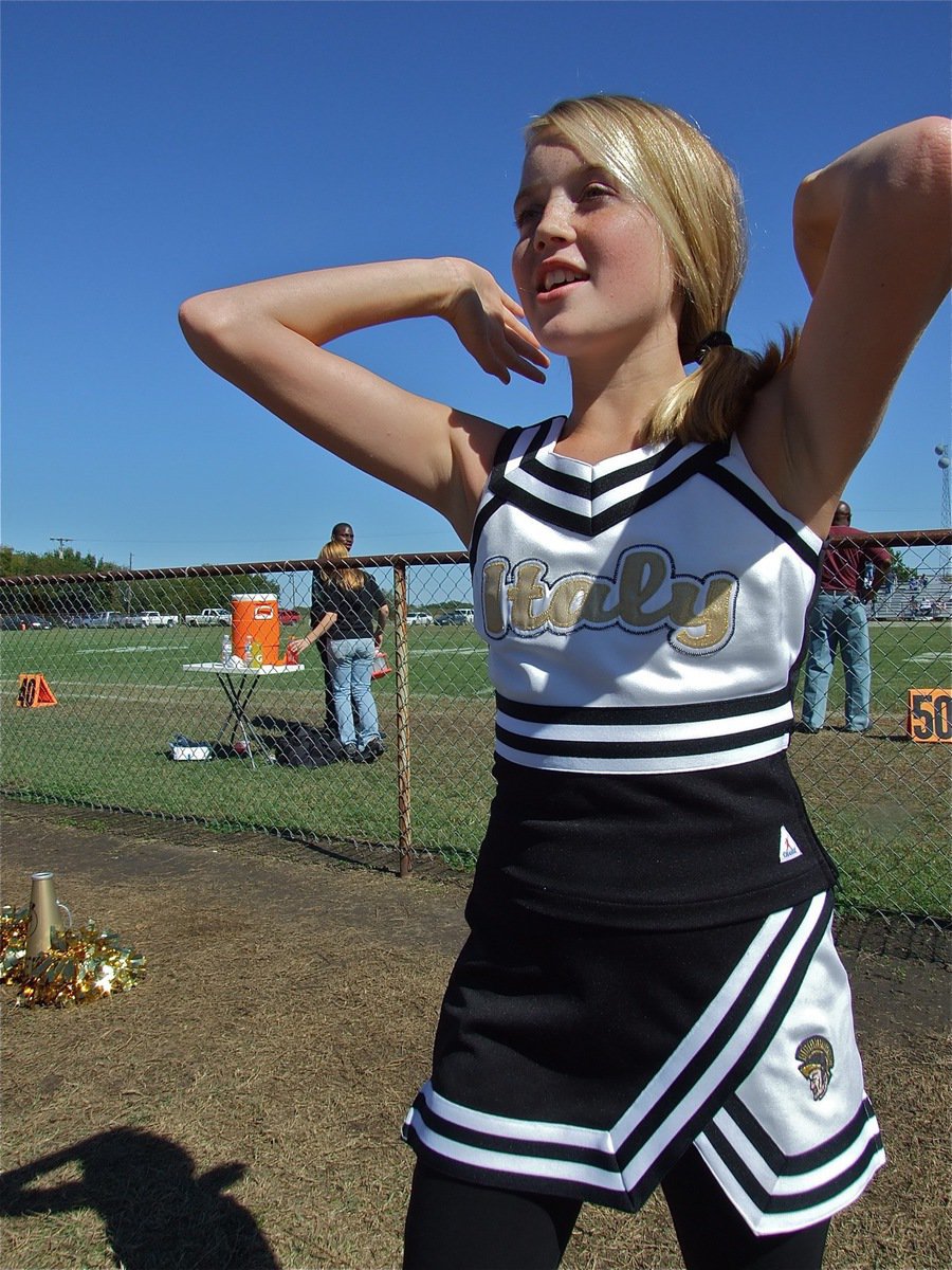 Image: We want… — …a touchdown! Hannah Washington raises the roof against the Dawson Bulldogs.